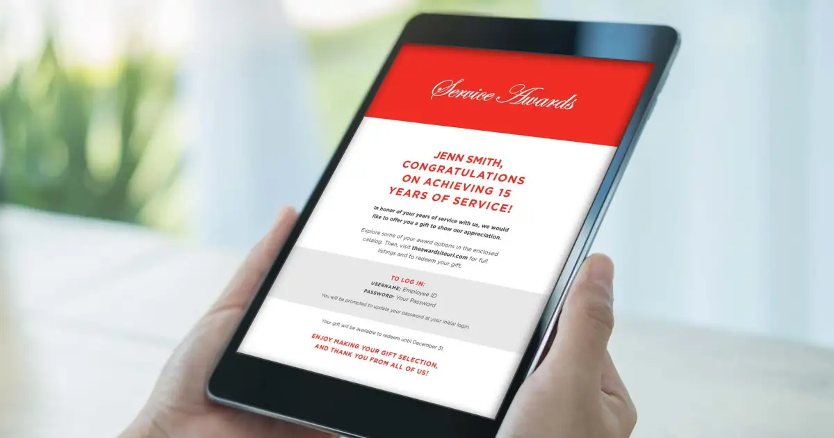 person viewing notification of years of service award on ipad